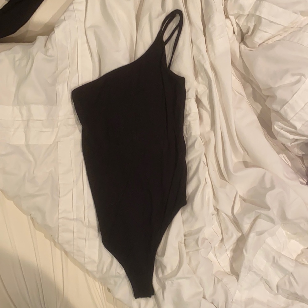 Black one shoulder body suit